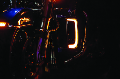 Kuryakyn Tracer Lower Fairing Grill in chrome for Harley Davidson touring models, showcasing the sleek, reflective motorcycle accessory.
