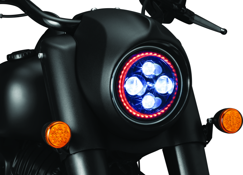 Kuryakyn Orbit Headlight Adapter for Indian Chieftain and Roadmaster motorcycle models, shown installed on bike headlight.