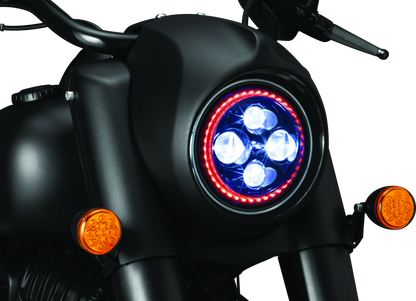 Kuryakyn Orbit Headlight Adapter for Indian Chieftain and Roadmaster motorcycle models, shown installed on bike headlight.