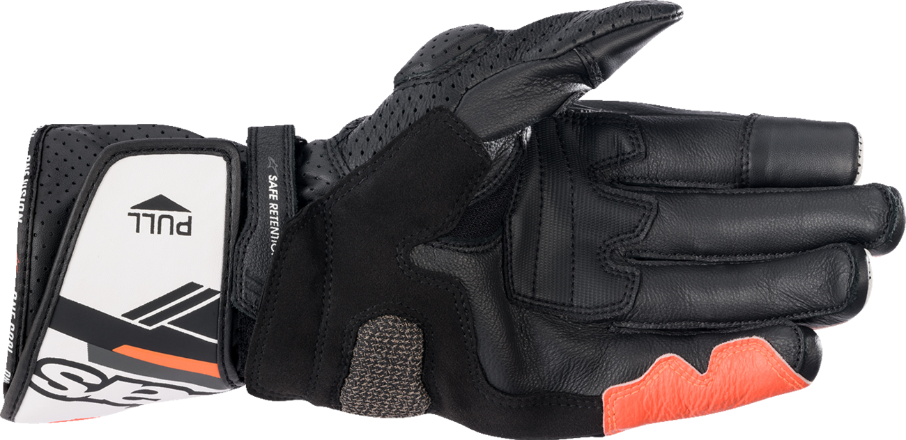 Alpinestars SP-8 V3 motorcycle gloves in black, white, and fluo red with reinforced knuckles and breathable fabric.