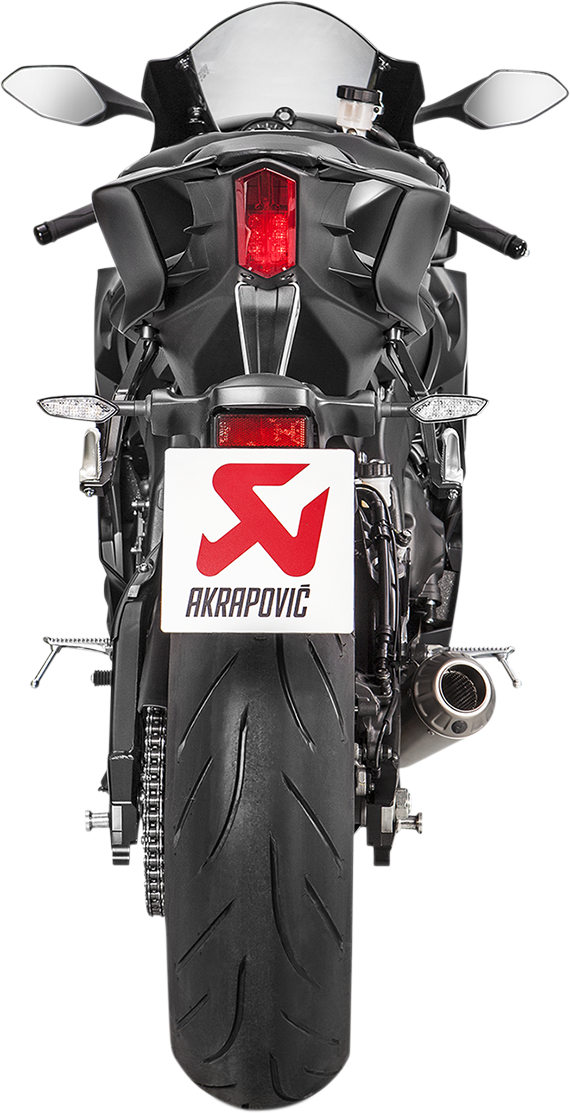 AKRAPOVIC slip-on titanium muffler for Yamaha YZF-R6 motorcycle, showcasing the sleek, metallic exhaust design.