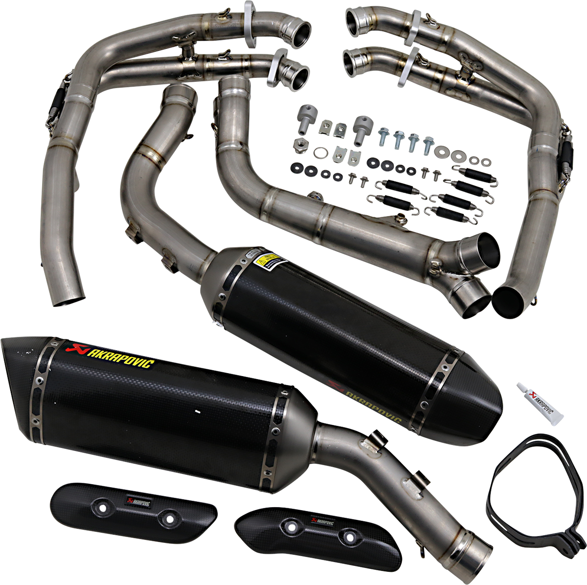 AKRAPOVIC Evolution carbon fiber exhaust for Yamaha YZF-R1 motorcycle, with sleek carbon fiber finish and polished metal components.