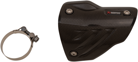 AKRAPOVIC carbon fiber heat shield for motorcycle exhaust, featuring a sleek black design and protective branding details.