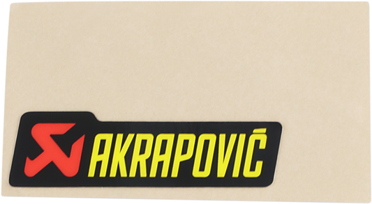 AKRAPOVIC Replacement Sticker P-HST4PO for motorcycle exhaust systems, showing a close-up of the black sticker with white logo text.