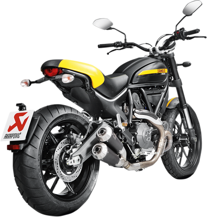 AKRAPOVIC titanium muffler for Ducati Scrambler, featuring sleek design and branded logo, detailed view of the motorcycle exhaust component.