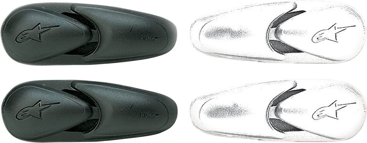 Alpinestars flexible white toe sliders for motorcycle boots, model 25SLITECH-BI, with textured surface for added grip.