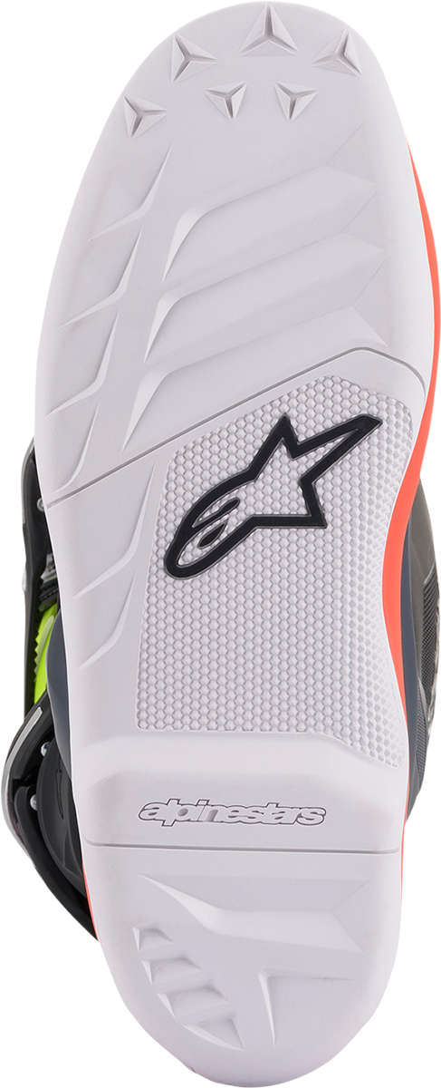 Alpinestars Youth Tech 7S bike boots in black, gray, red, white, and yellow with protective design and adjustable straps.