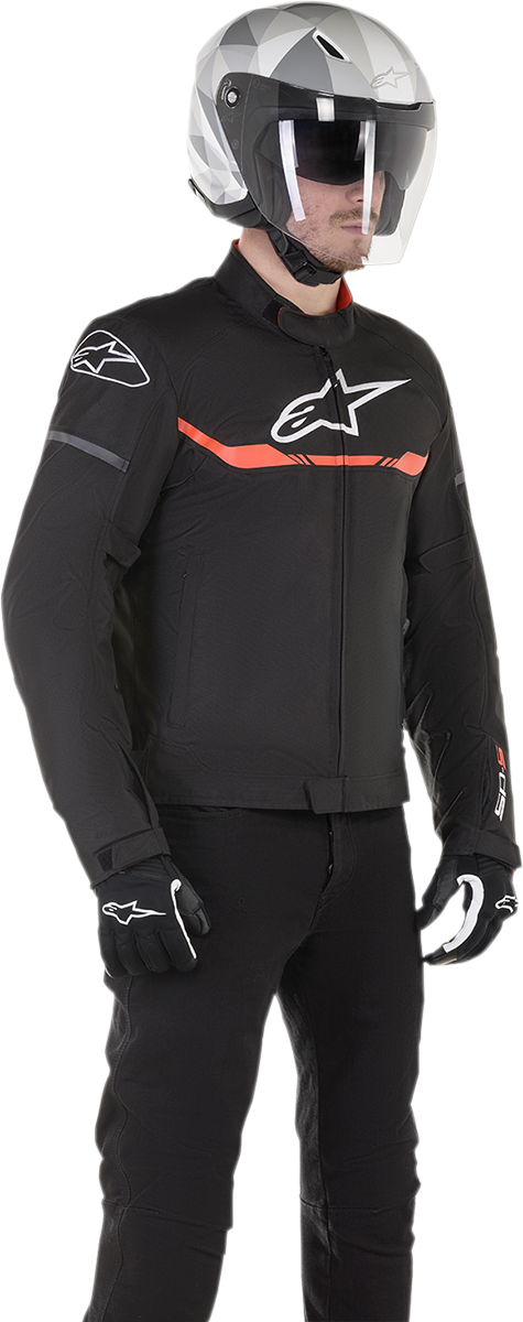 Alpinestars T-SP S waterproof motorcycle jacket in black and red fluo, size medium, with reflective details and waterproof material.