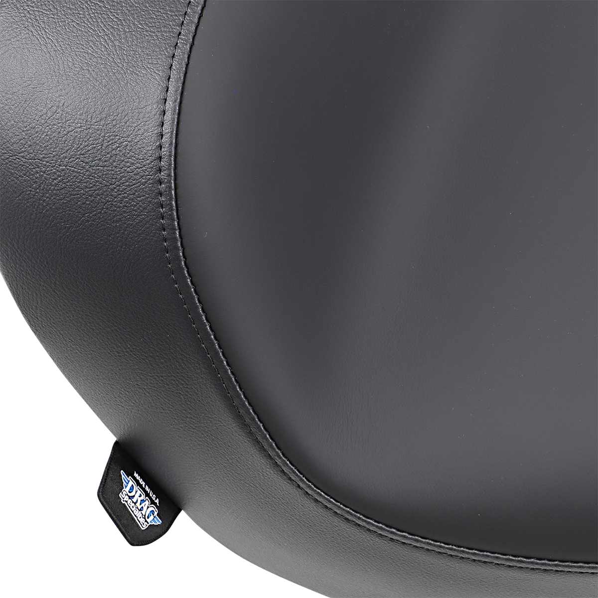 Smooth solo seat for FXST/FLST Harley Davidson motorcycles, by Drag Specialties Seats, designed for comfortable riding from 1984-1999.