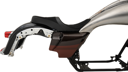 Low touring seat by Drag Specialties with vinyl cover for Harley FL models 2008-2023, shown on motorcycle seat.