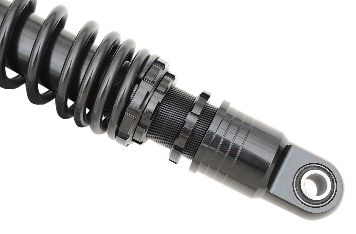Black 12-inch DRAG SPECIALTIES SHOCKS premium ride-height adjustable shocks for motorcycles.