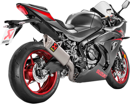 AKRAPOVIC Evolution Titanium Exhaust System for Ultimate Lightweight Performance, featuring sleek titanium design and exhaust pipes.