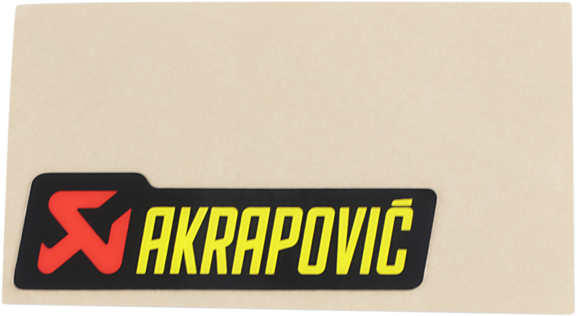 AKRAPOVIC Replacement Sticker P-HST4PO for motorcycle exhaust systems, featuring the AKRAPOVIC brand logo on a sticker.