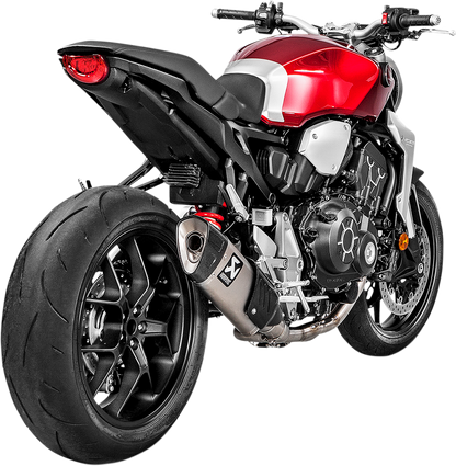 Akrapovic titanium muffler for Honda CB1000R motorcycle, showcasing sleek metallic design and branding detail.