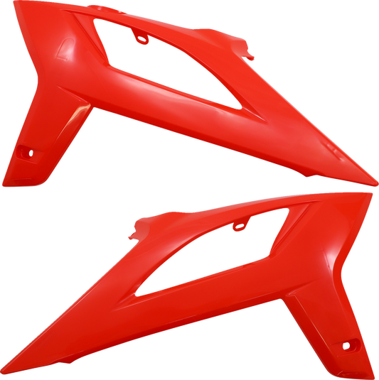 A red Acerbis full replacement body kit for motorcycles, showcasing sleek, aerodynamic design components.