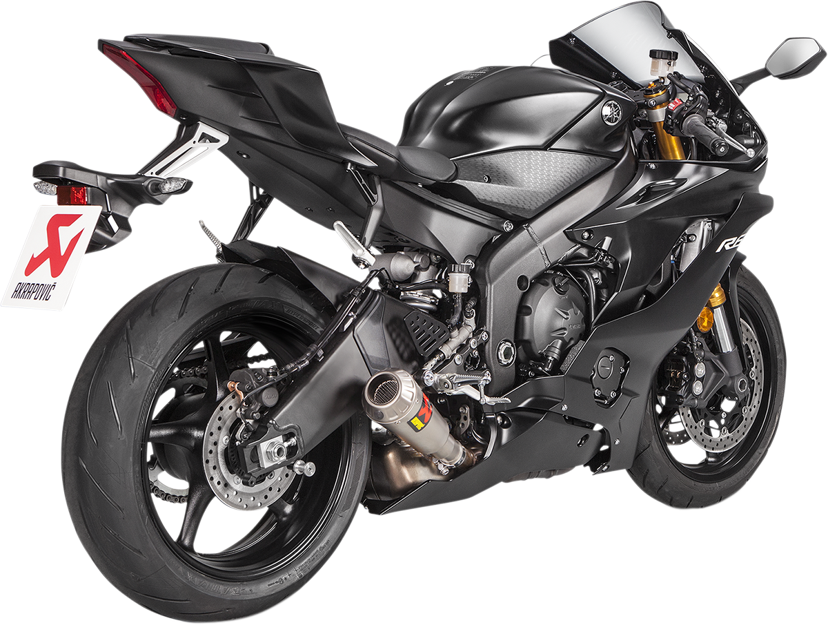 AKRAPOVIC slip-on titanium muffler for Yamaha YZF-R6 motorcycle, featuring sleek design and polished finish.