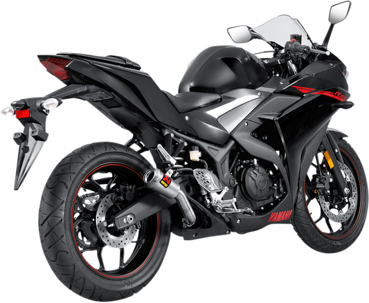 AKRAPOVIC stainless steel slip-on exhaust system with sleek design and branding, designed for enhanced motorcycle performance.