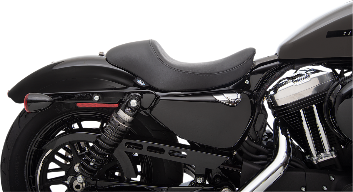 Black smooth 3/4 solo seat for Harley-Davidson XL by Drag Specialties, offers improved comfort and stylish design.