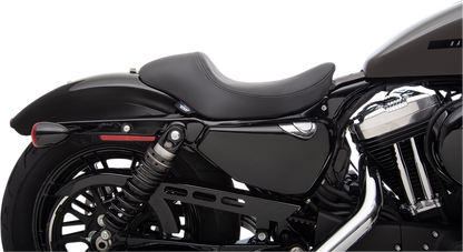 Black smooth 3/4 solo seat for Harley-Davidson XL by Drag Specialties, offers improved comfort and stylish design.