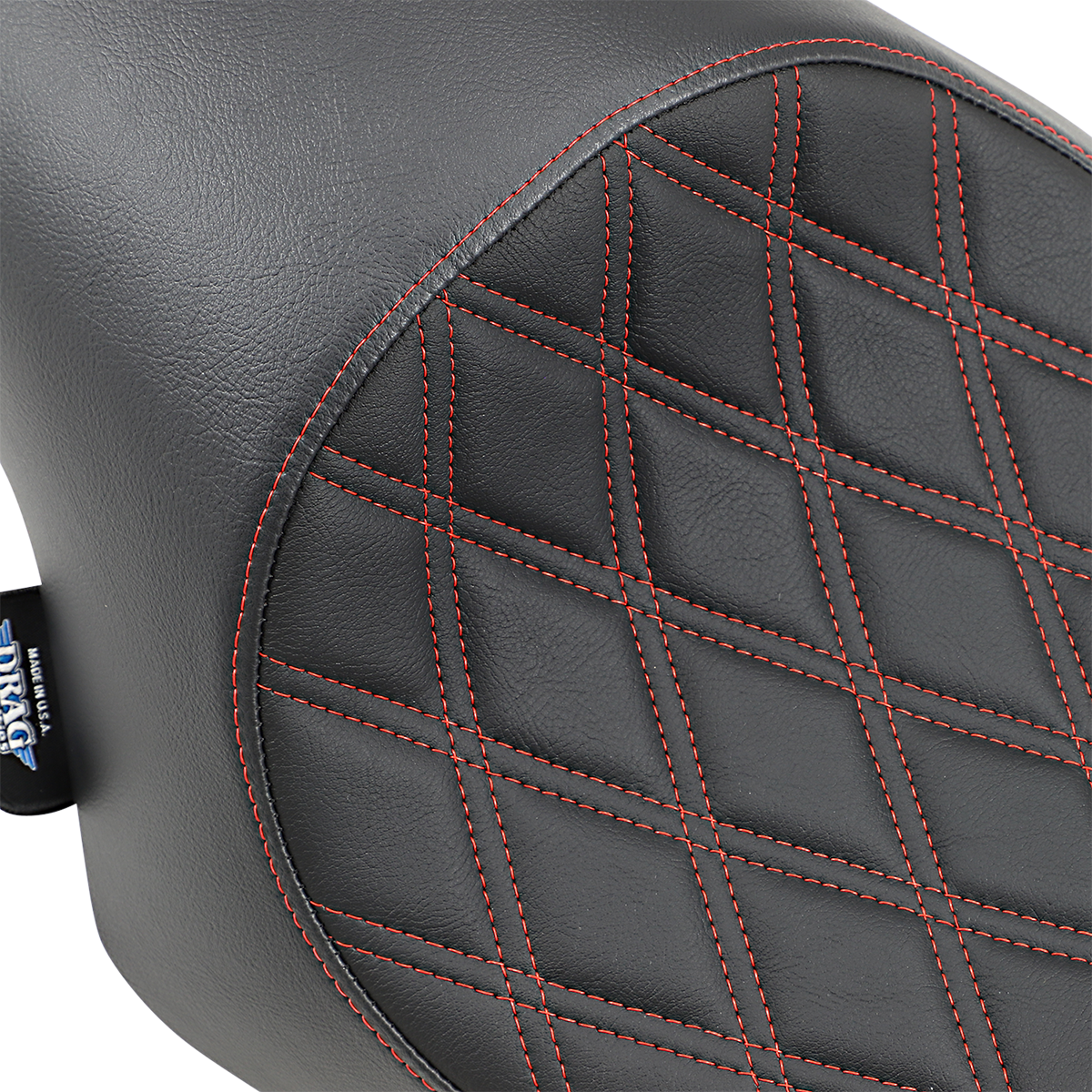 Black 3/4 solo seat with red stitching from Drag Specialties for Harley XL '04-'22, featuring double diamond pattern.