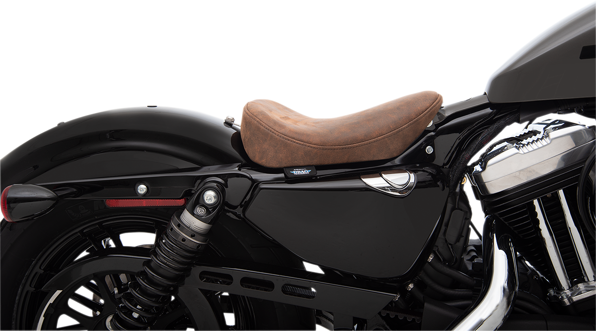 Brown distressed solo seat by Drag Specialties for Harley XL 2010-2022, designed for a classic bobber motorcycle style.