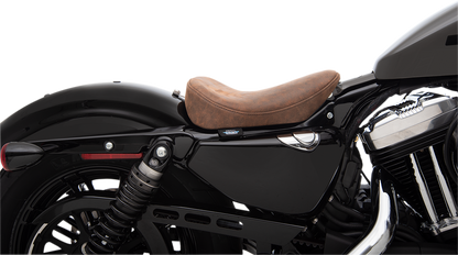 Brown distressed solo seat by Drag Specialties for Harley XL 2010-2022, designed for a classic bobber motorcycle style.