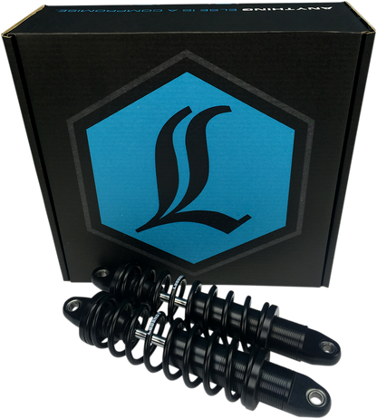 Legend Suspension Revo Coil Suspension, 12-inch black coil spring, standard model 1310-1100, displayed on a vehicle suspension system.