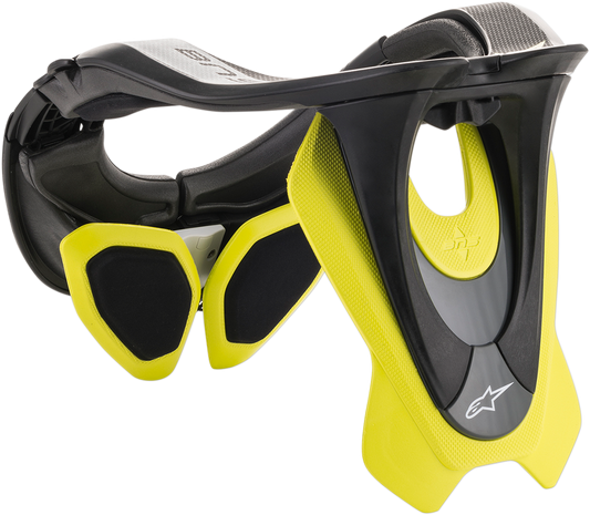 Alpinestars BNS Tech 2 youth impact protection helmet in black and yellow fluorescent, size XS-M, with sturdy design and secure straps.