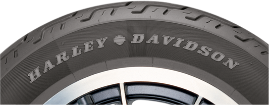 Dunlop D401 rear motorcycle tire for Harley Davidson, 130/90B16 73H, showing tread pattern and sidewall details