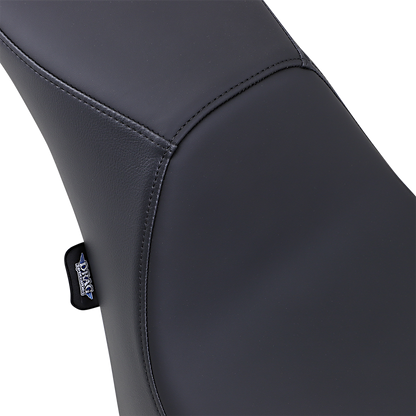 Drag Specialties Predator 2-up seat for FXST/FLST motorcycles, smooth black seat with contoured design for comfortable riding.