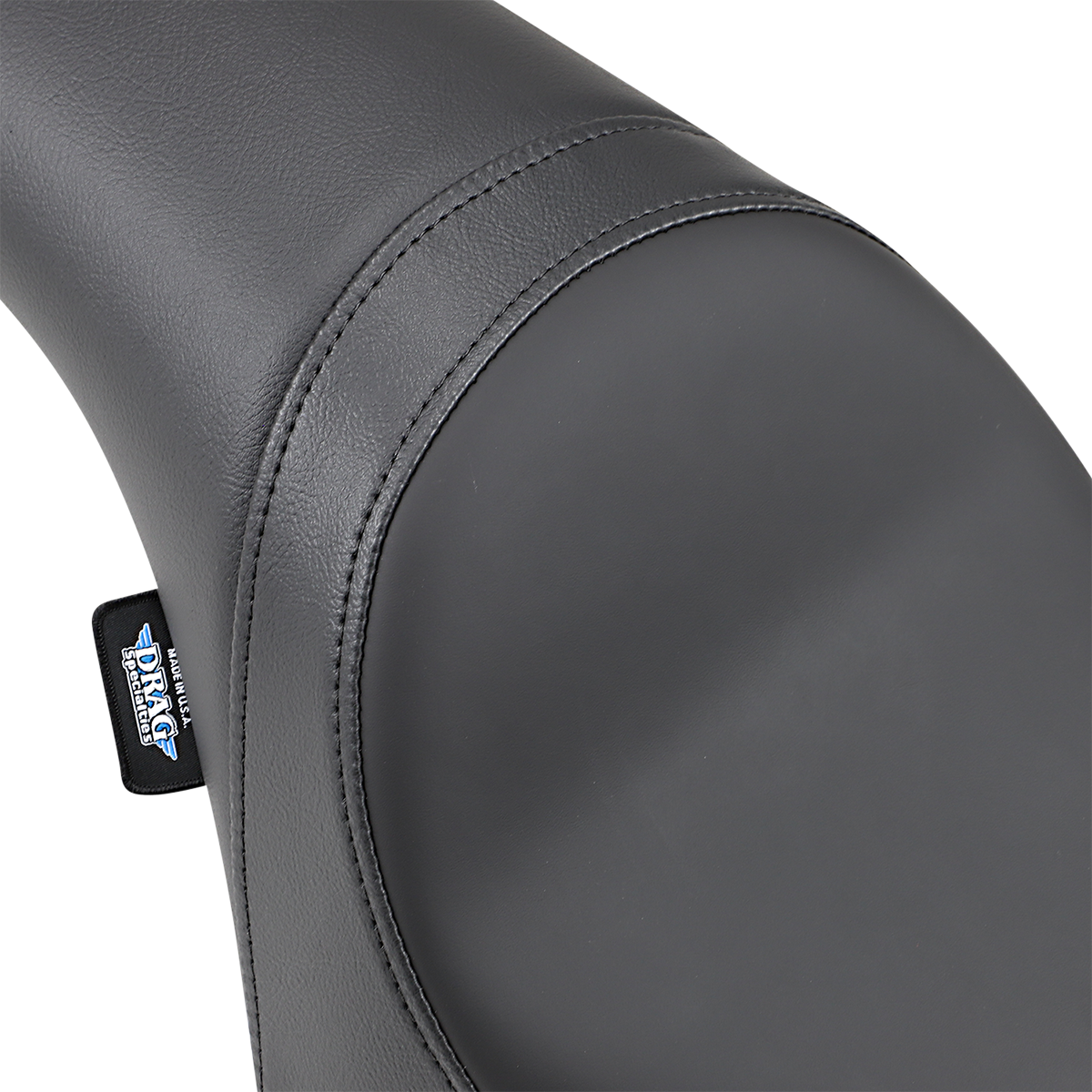 Drag Specialties Predator Seat for Harley XL '82-'03, smooth black motorcycle seat with contoured design and textured surface.