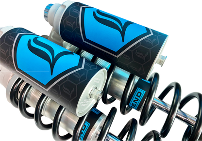 Legend Suspension Revo ARC piggyback shocks for Harley Dyna, 13-inch heavy-duty suspension with clear finish and ARC technology.