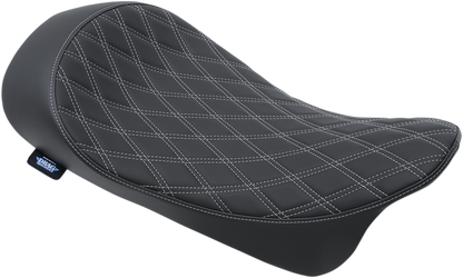 Drag Specialties low solo seat with double diamond silver stitching for Harley FL 2008-2023 motorcycle, shown from the side.