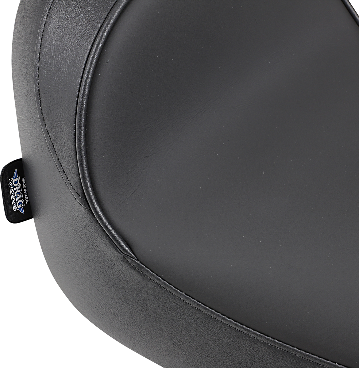 Drag Specialties solo motorcycle seat with driver backrest for FXST/FLST 1984-1999, featuring smooth finish and cooler surface.