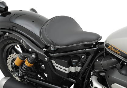 Black leather solo seat by Drag Specialties with white stitching and solar-reflective material for Harley-Davidson motorcycles.