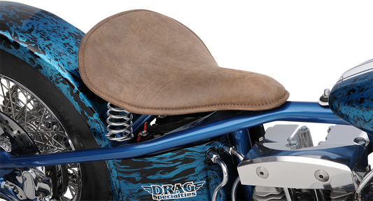 Drag Specialties solo spring seat in low-profile brown with perimeter stitch, designed for bobber style motorcycles.