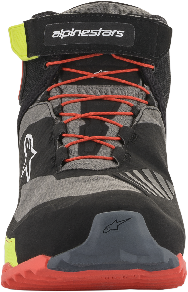 Alpinestars CR-X Drystar® motorcycle shoes in black, red, and yellow fluorescent with weather protection and comfort features.