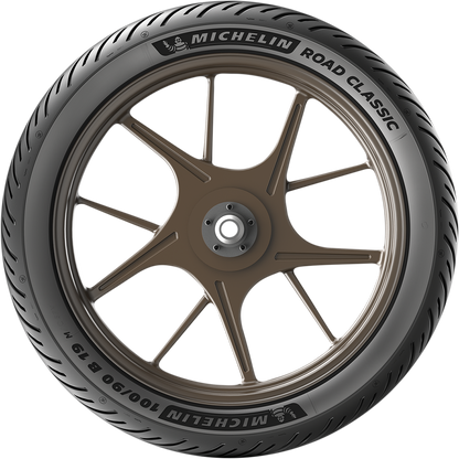 Michelin Road Classic front tire 100/90B19 57V mounted on a Triumph Bonneville T100 or Street Twin motorcycle.