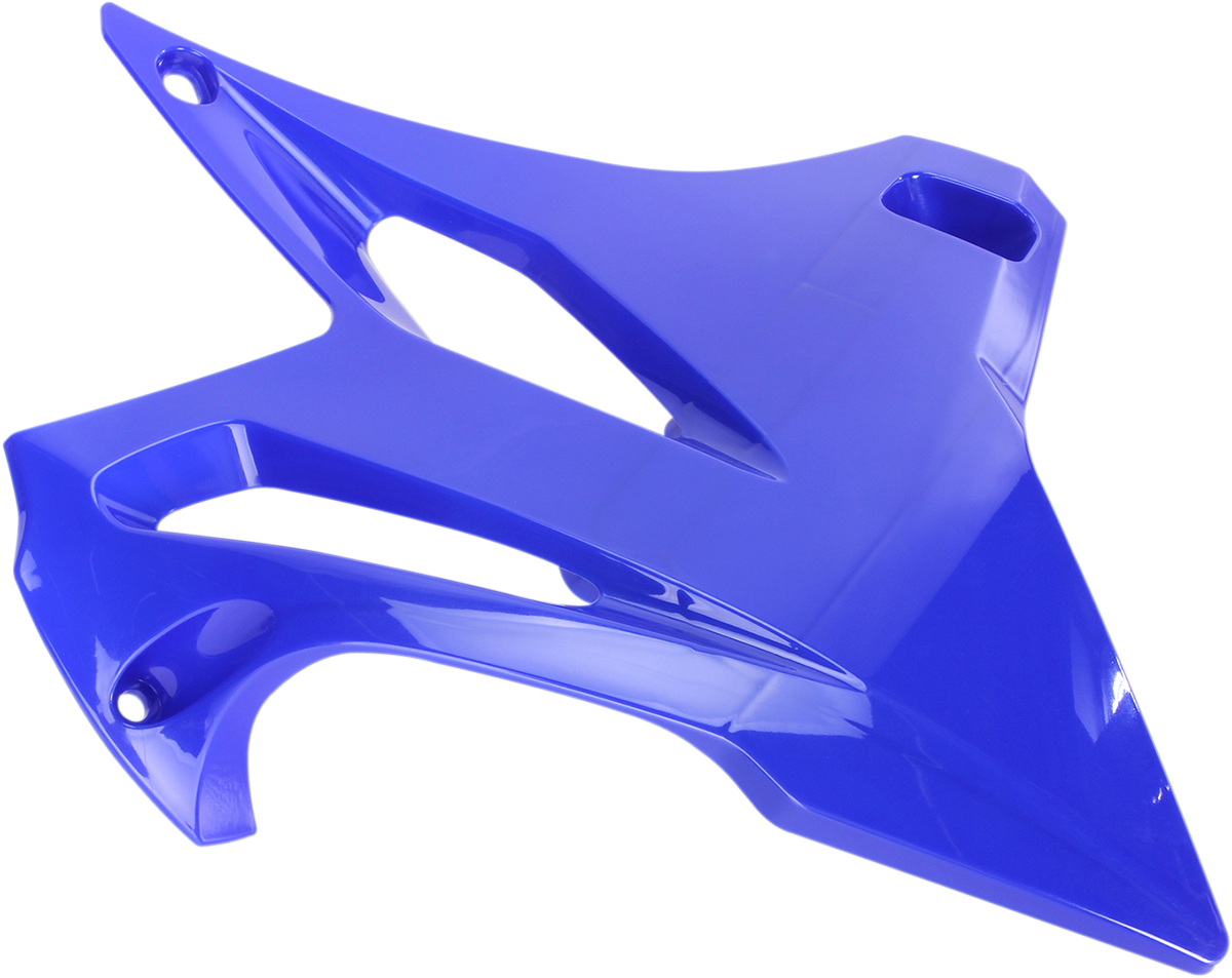 Acerbis blue radiator shrouds for off-road motorcycle, mounted on bike body with Acerbis branding and vibrant blue color.