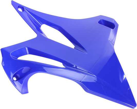 Acerbis blue radiator shrouds for off-road motorcycle, mounted on bike body with Acerbis branding and vibrant blue color.