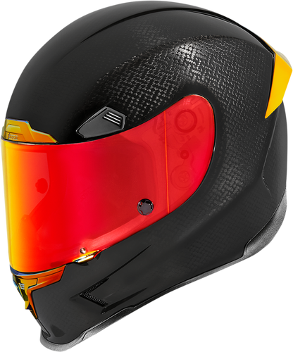 Red ICON Airframe Pro™ helmet in small size with carbon shell, featuring sleek aerodynamic design and detailed ventilation openings.