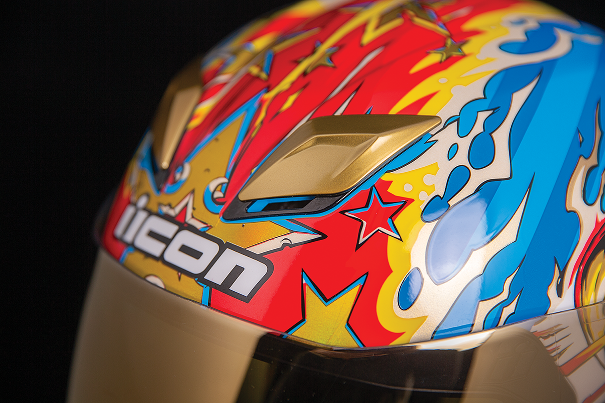 Bill's Exhausts ICON Airflite™ Helmet Freedom Spitter Gold large motorcycle helmet with aerodynamic design and clear visor.