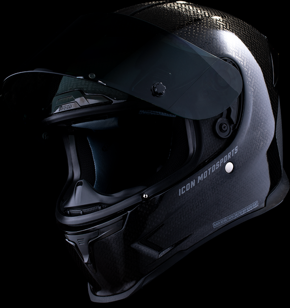 Black ICON Airframe Pro™ helmet in carbon finish with XL size, featuring sleek aerodynamic design and advanced safety features.