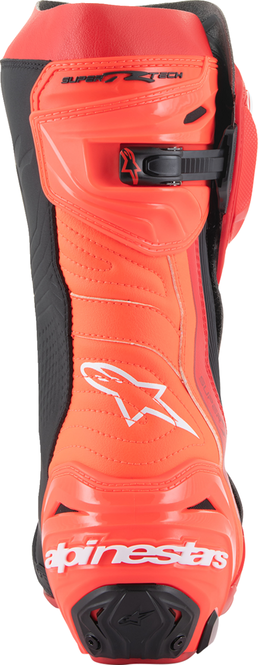 Alpinestars Supertech R motorcycle boots in red, US 9.5 / EU 44, featuring protective design and racing style.
