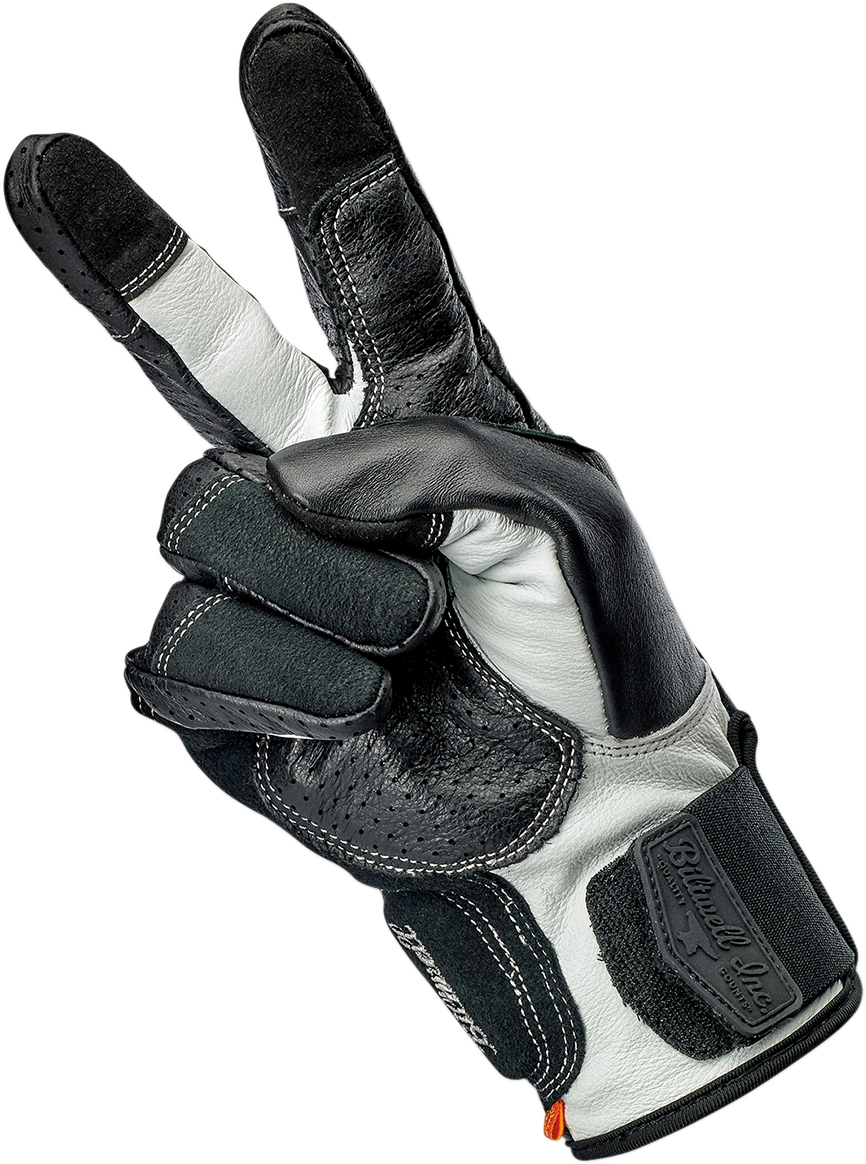 Black and cement BILTWELL Borrego gloves in medium size, featuring textured leather and secure wrist closure for motorcycle riding.