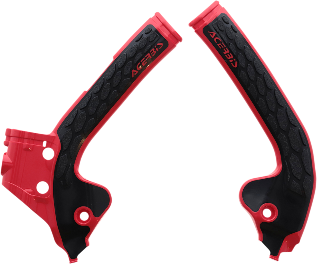 A set of ACERBIS X-Grip motorcycle frame guards in red and black, designed for body protection and style.