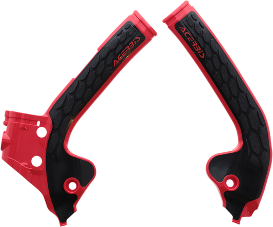 A set of ACERBIS X-Grip motorcycle frame guards in red and black, designed for body protection and style.