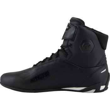 Alpinestars Stella Faster-4 black motorcycle shoes with US 9.5 size, featuring durable design and logo details.