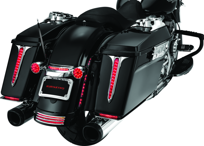 Chrome Kuryakyn curved license plate mount for Harley-Davidson Street Glide and Road Glide motorcycles.