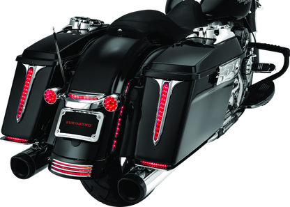 Chrome Kuryakyn curved license plate mount for Harley-Davidson Street Glide and Road Glide motorcycles.